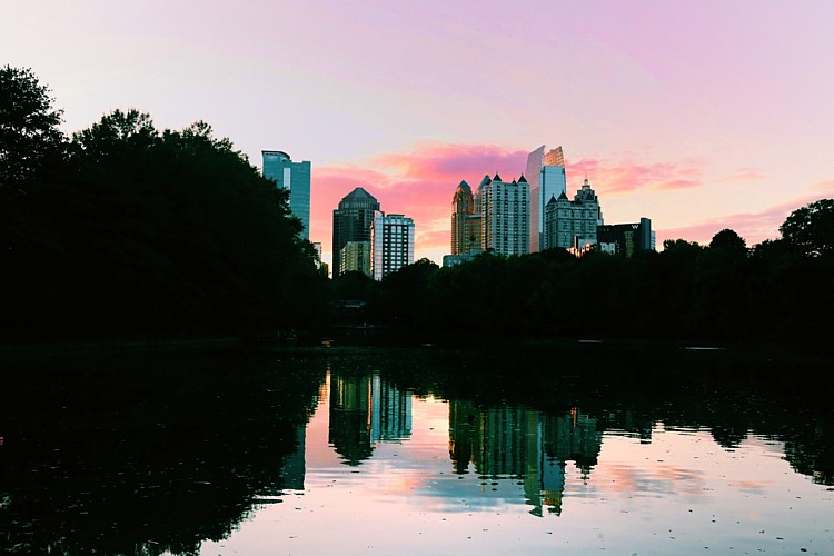 Atlanta skyline shot across the pond at Piedmont Park